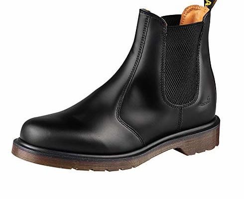 A black leather Chelsea boot with an elastic side panel, photographed on white.